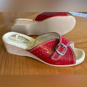 Wedge/platform, slip on red leather sandals, new, never worn.